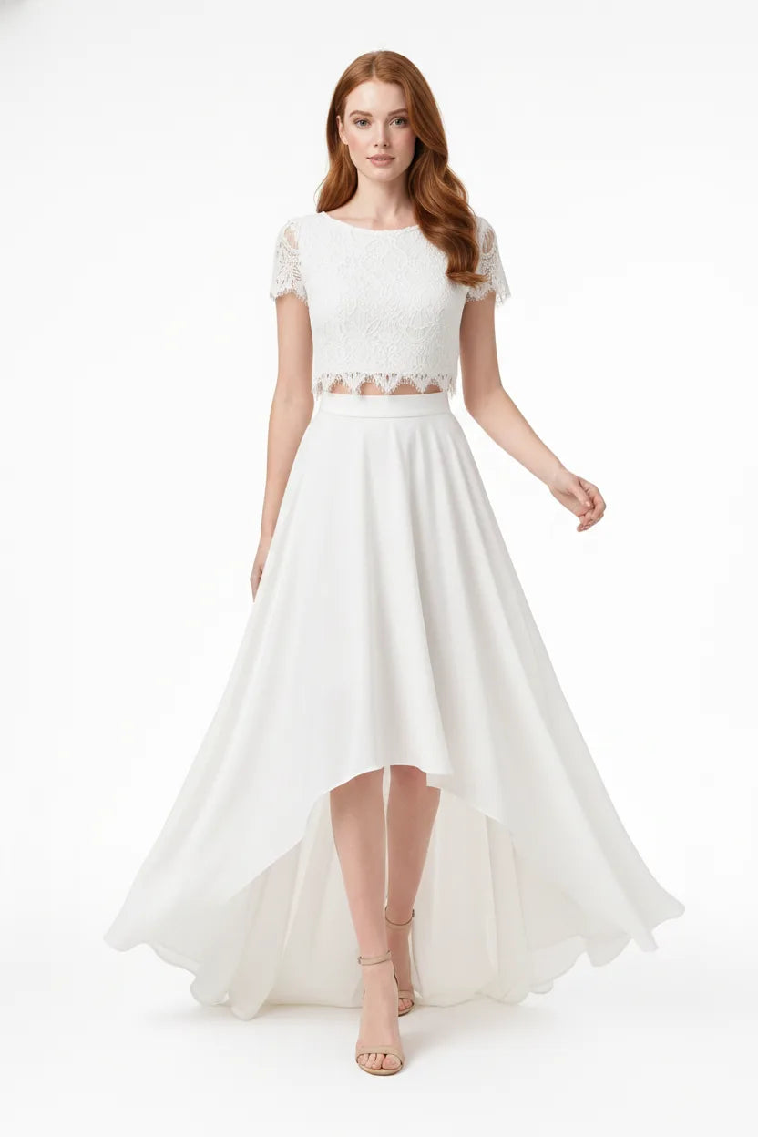 White lace crop bridal top and skirt set on model in natural movement