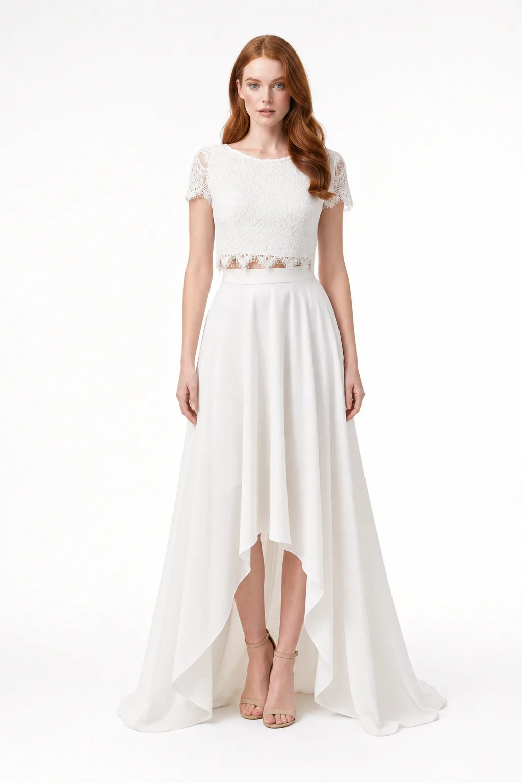 White lace crop bridal top and skirt set on model in contrapposto stance