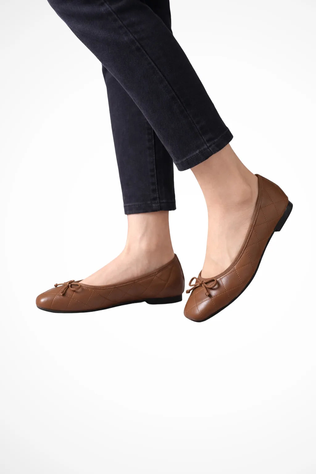 Quilted square toe ballet flat in brown, front view