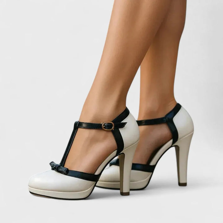 White t-strap platform pump rear view showcasing chunky block heel