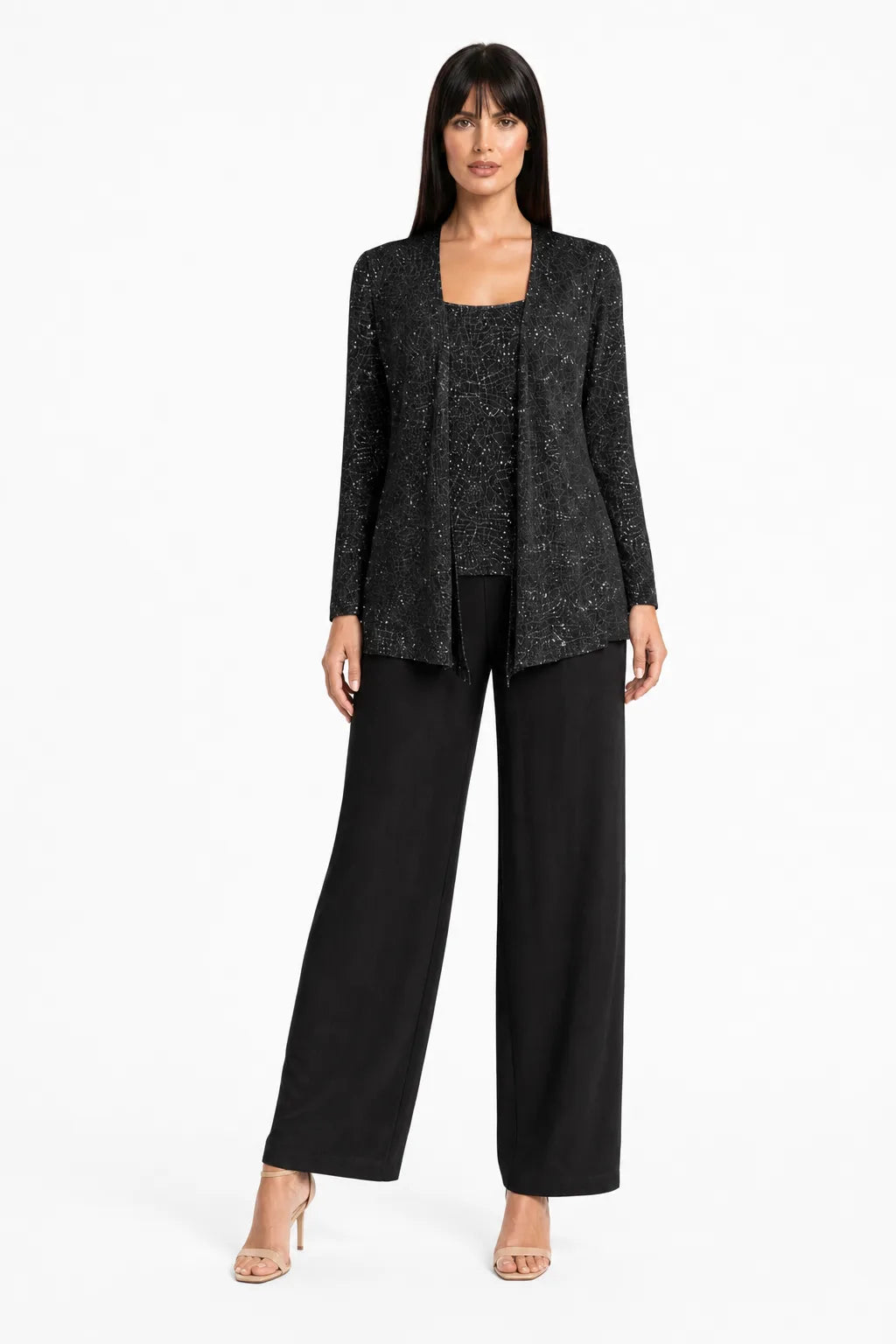 Black sequin lace three-piece set on model in contrapposto stance