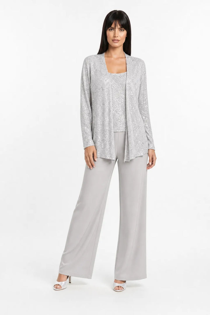 Silver sequin lace three-piece set on model in contrapposto stance