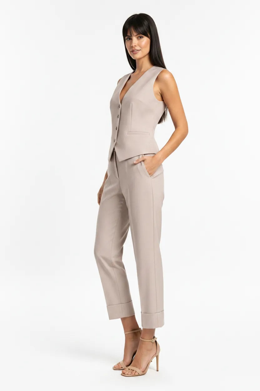 Beige waistcoat and matching trousers set on model in three-quarter turn