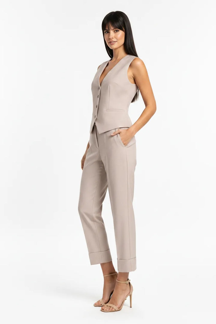 Beige waistcoat and matching trousers set on model in three-quarter turn