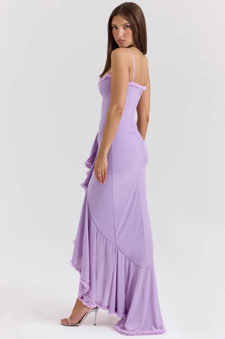Model in yellow ruffle slit maxi dress, movement pose showing skirt flow