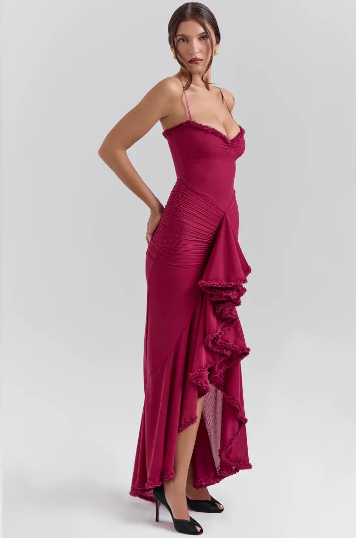 Model wearing a yellow ruffle slit maxi dress, close view of ruffle tiers