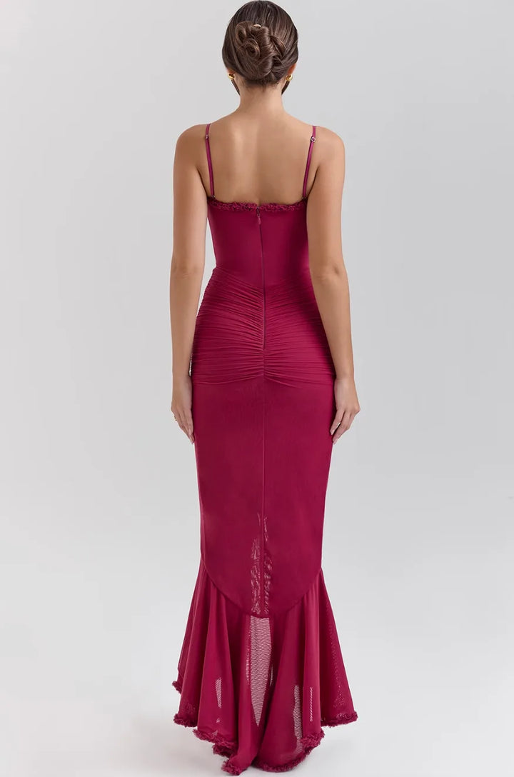 Model in yellow ruffle slit maxi dress, full-length posed standing shot