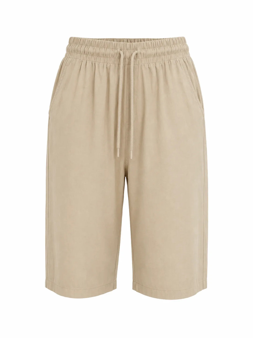 White drawstring capri pants on model, full-length view highlighting drawstring waist detail
