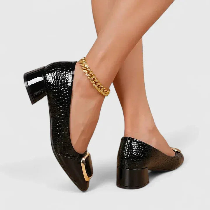 Black croc-embossed block heel pump, heel view
