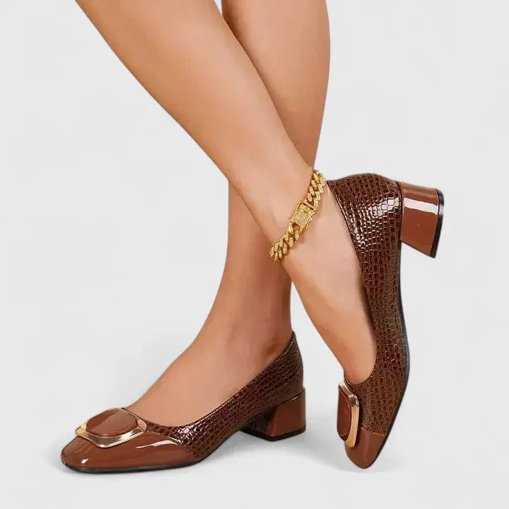 Brown croc-embossed block heel pump, close-up texture detail