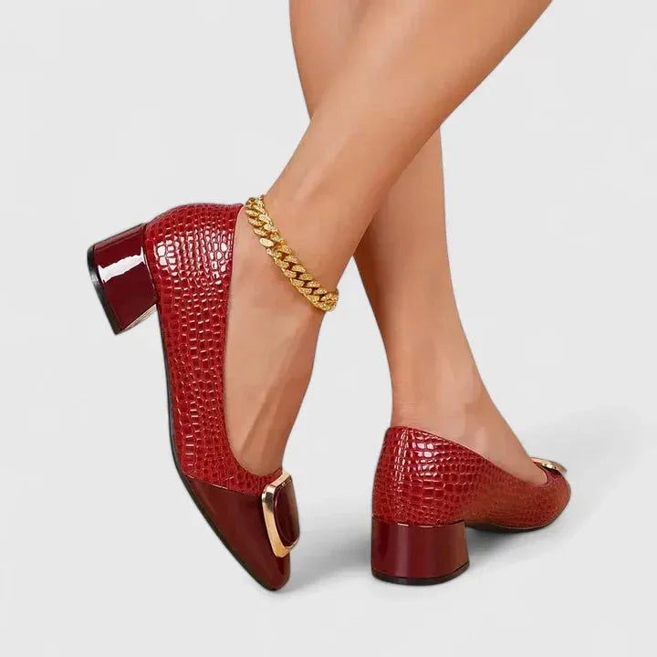Burgundy croc-embossed block heel pump, side profile view
