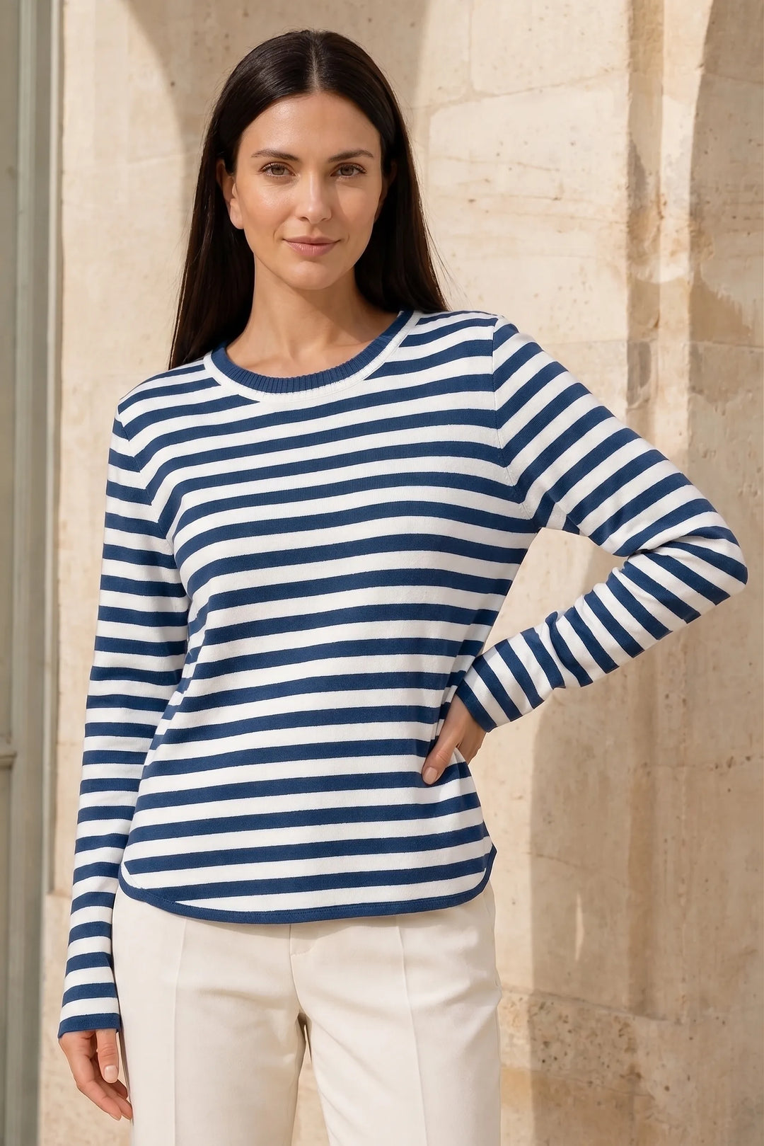 Blue striped long sleeve top on model in three-quarter turn