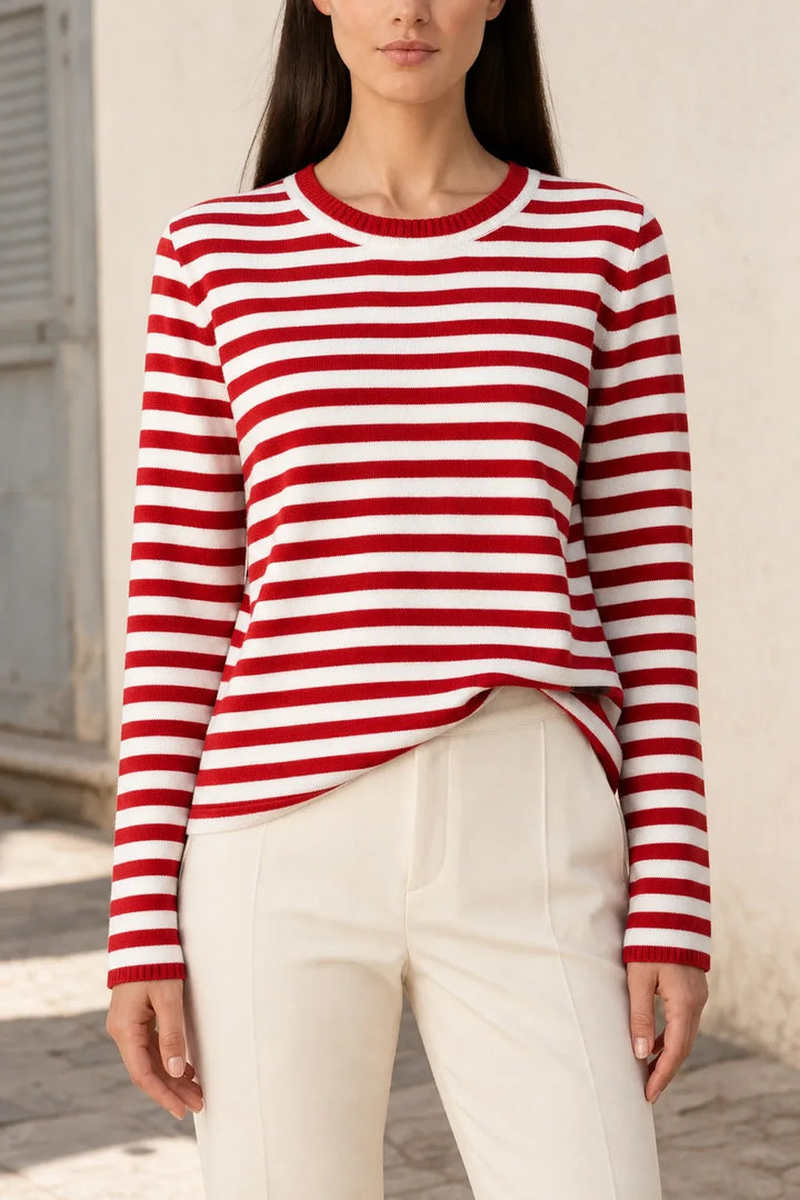 Red striped long sleeve top on model in contrapposto stance