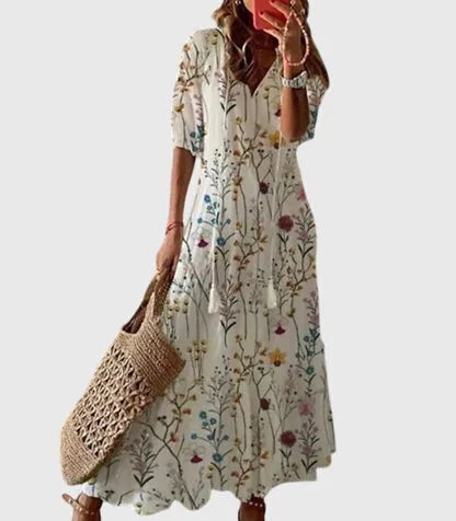 Floral print midi dress on model, displaying an all-over pattern with a casual relaxed fit