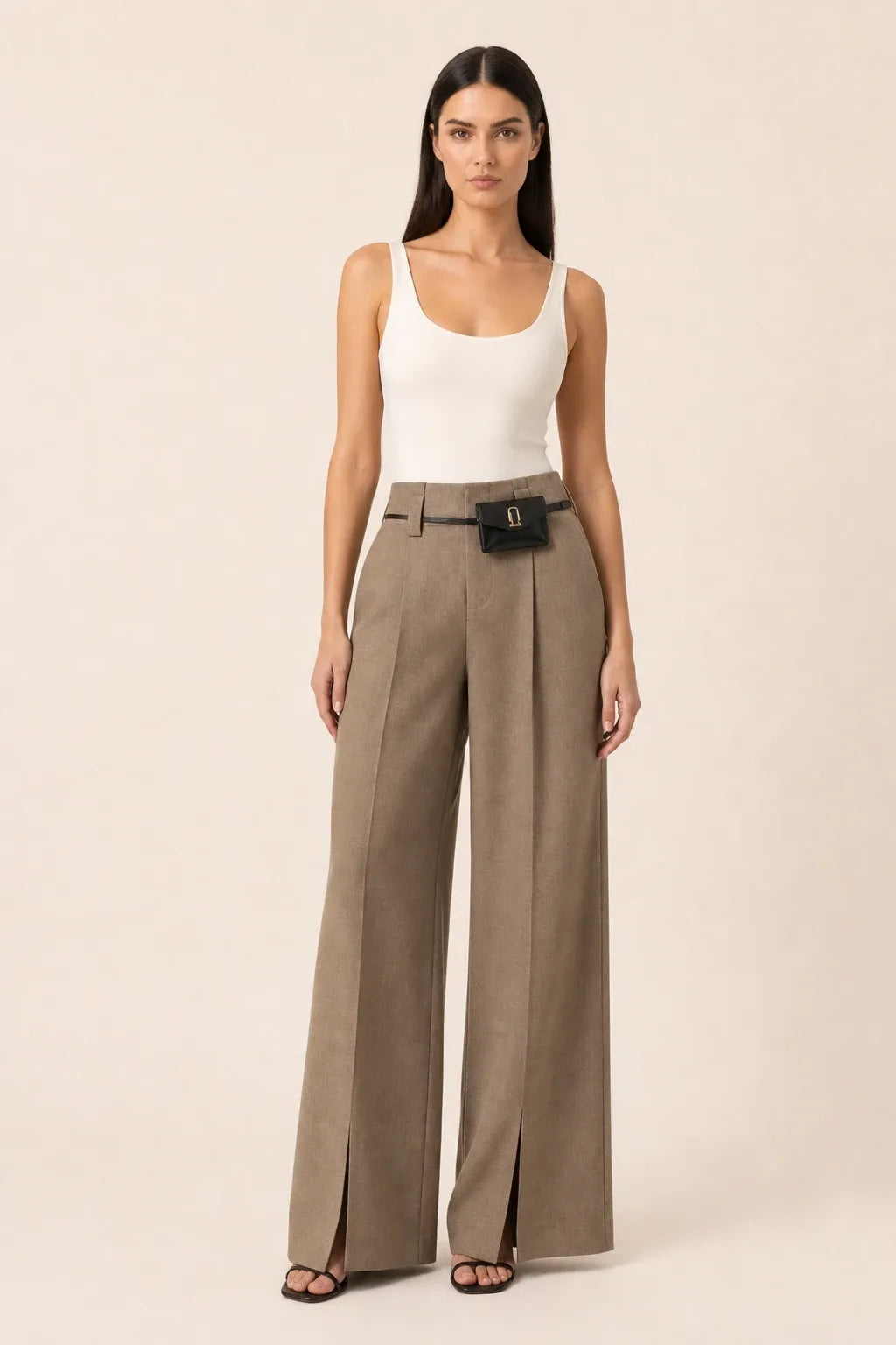 Khaki wide leg pants with split hem, model in contrapposto stance