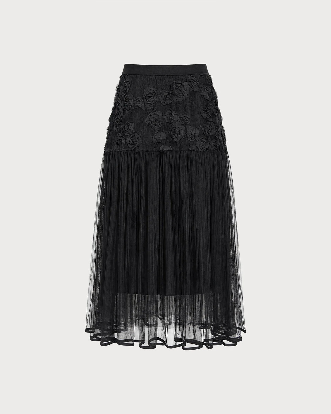 Black rose appliqué midi dress, model in three-quarter turn