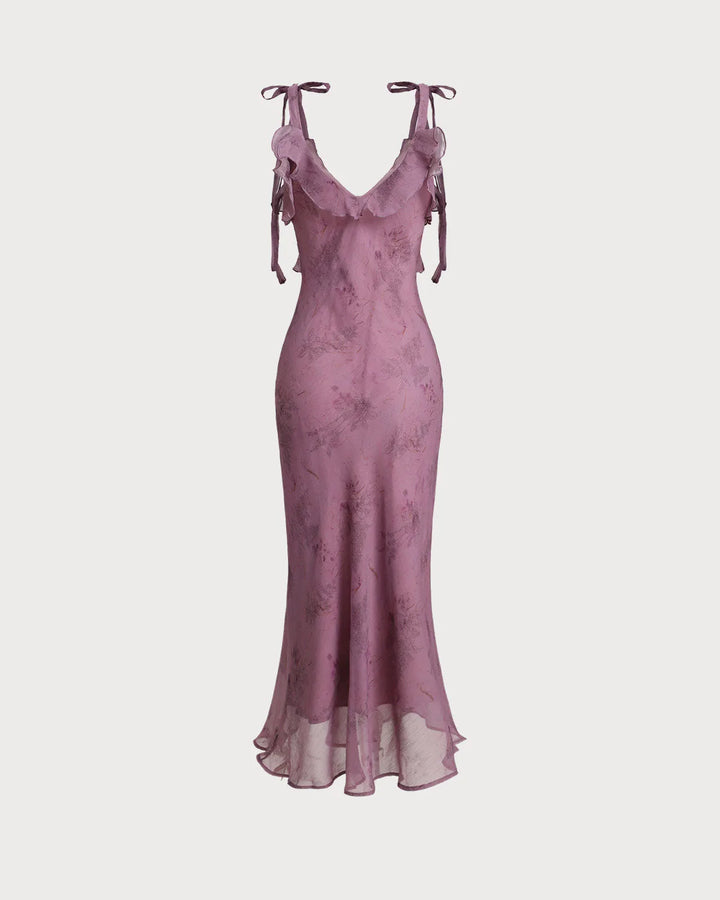Close-up detail of ruffle tie straps on a purple midi dress