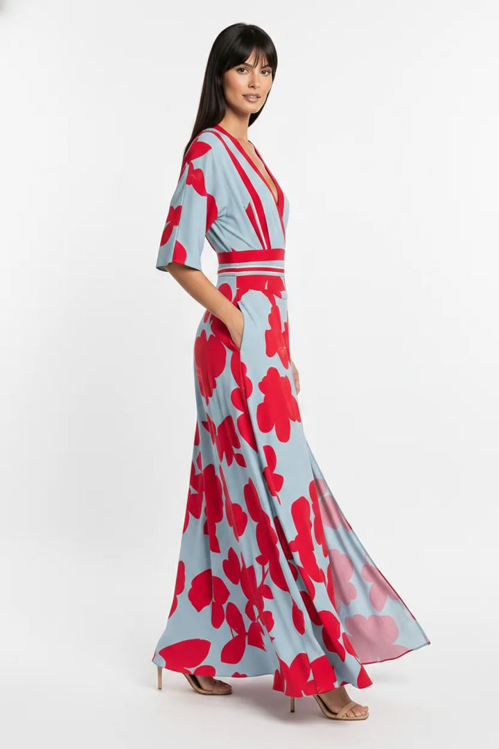 Red floral wrap maxi dress on a model in a three-quarter turn