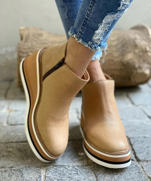 Beige wedge platform ankle boot, heel view