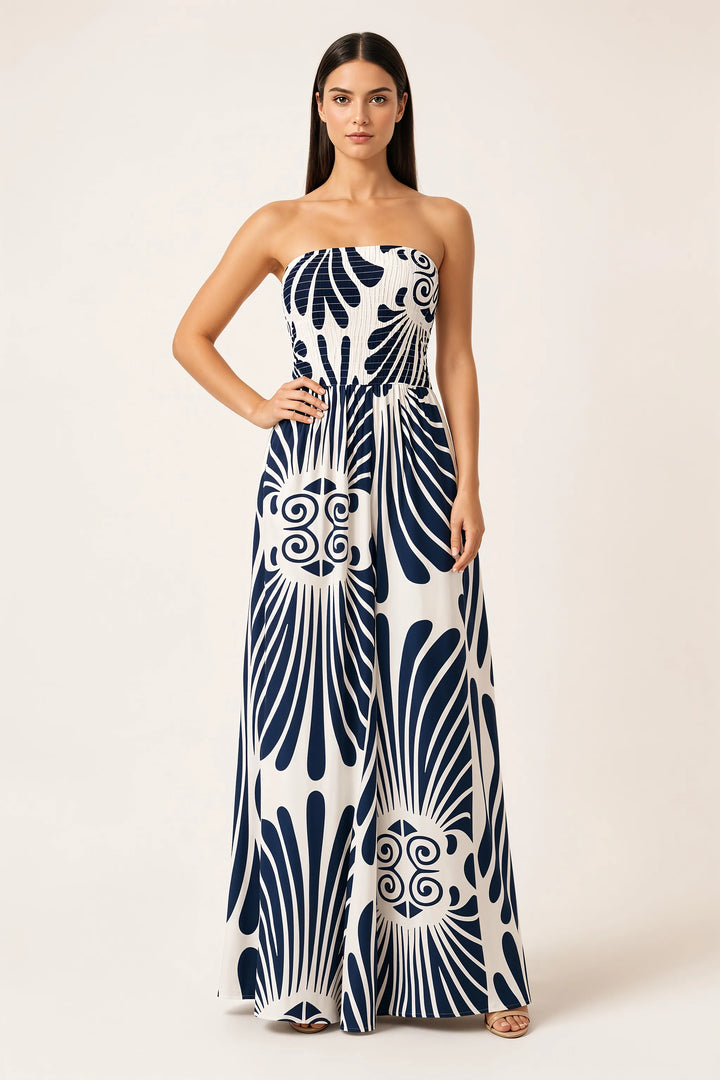 Blue smocked print jumpsuit on model in contrapposto stance