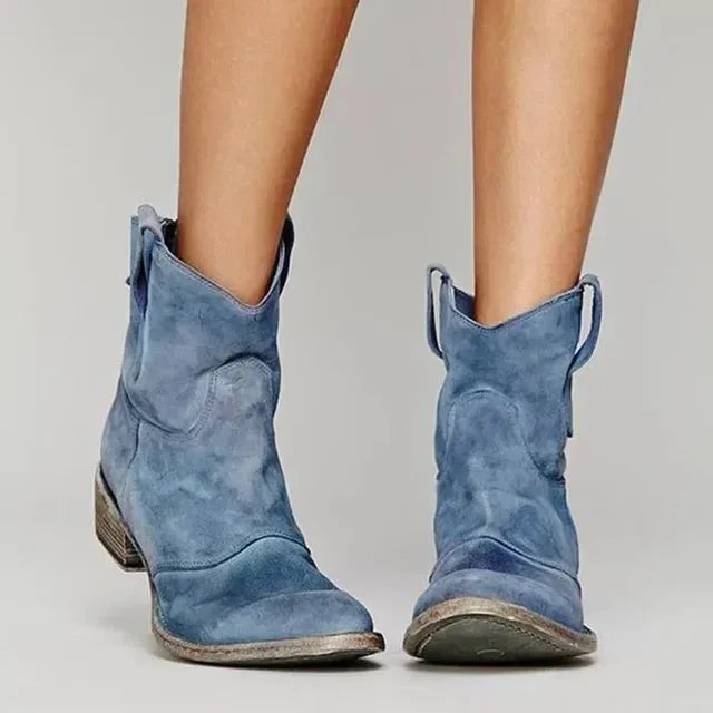 Blue fringe western ankle boot, close-up detail of fringe and stitching texture