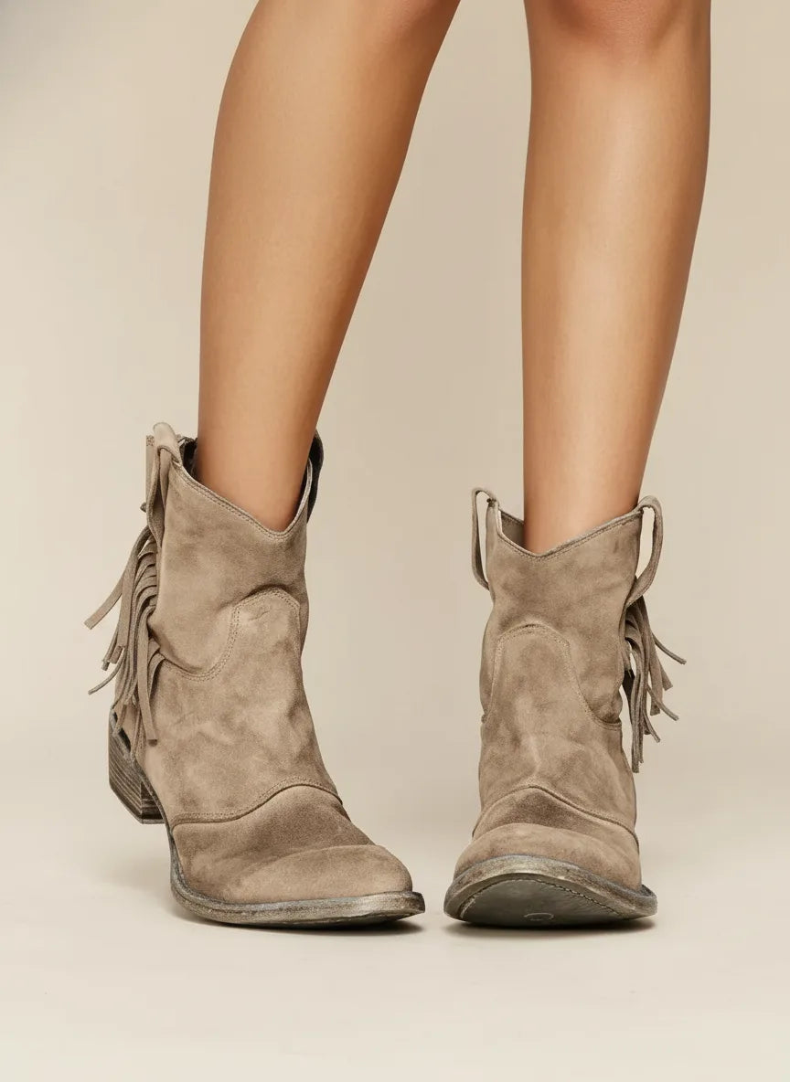 Brown fringe western ankle boot, side profile highlighting shaft height and fringe trim