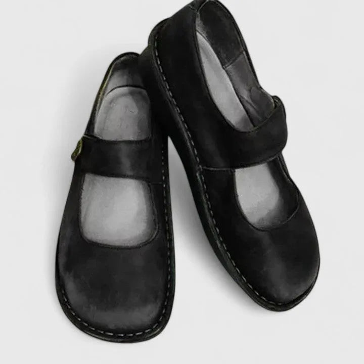 Black velcro strap mary jane shoe, heel view