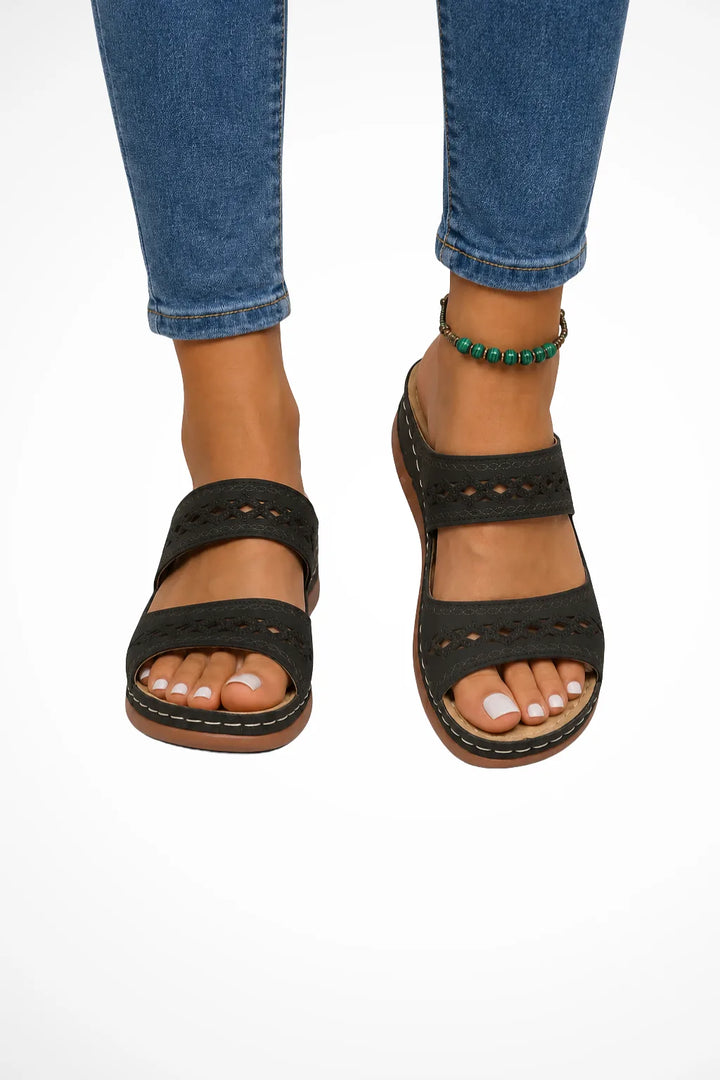 Black cutout two-strap slide sandal, front view