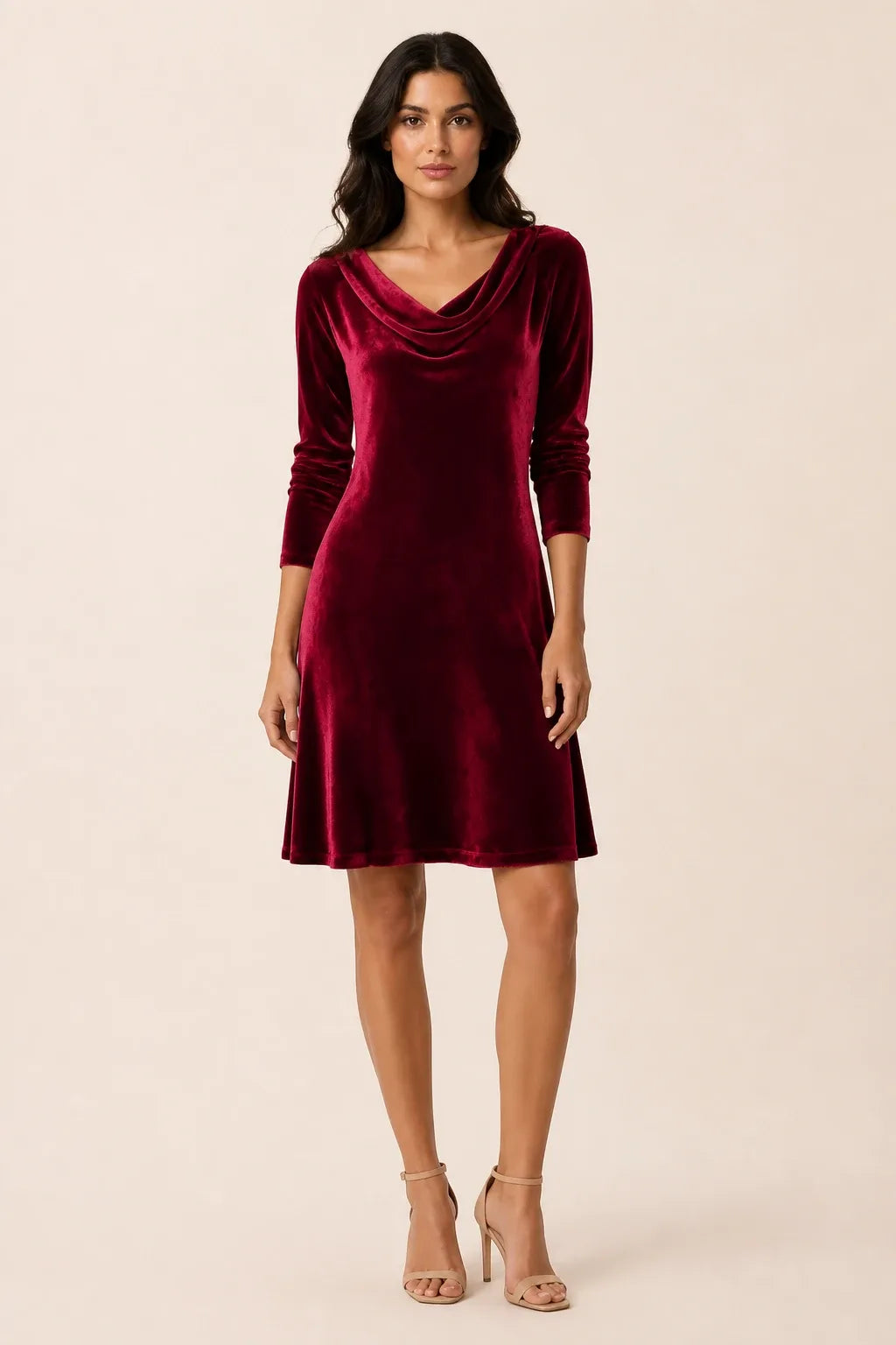 Red velvet cowl-neck mini dress on a model in a contrapposto stance