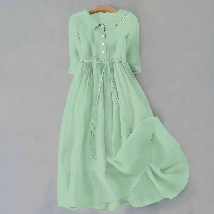 Light green midi dress with Peter Pan collar on standing model