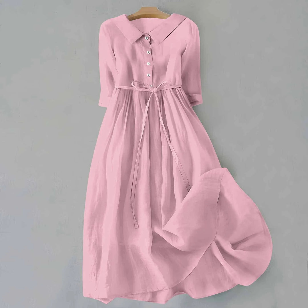 Pink Peter Pan collar midi dress on standing model