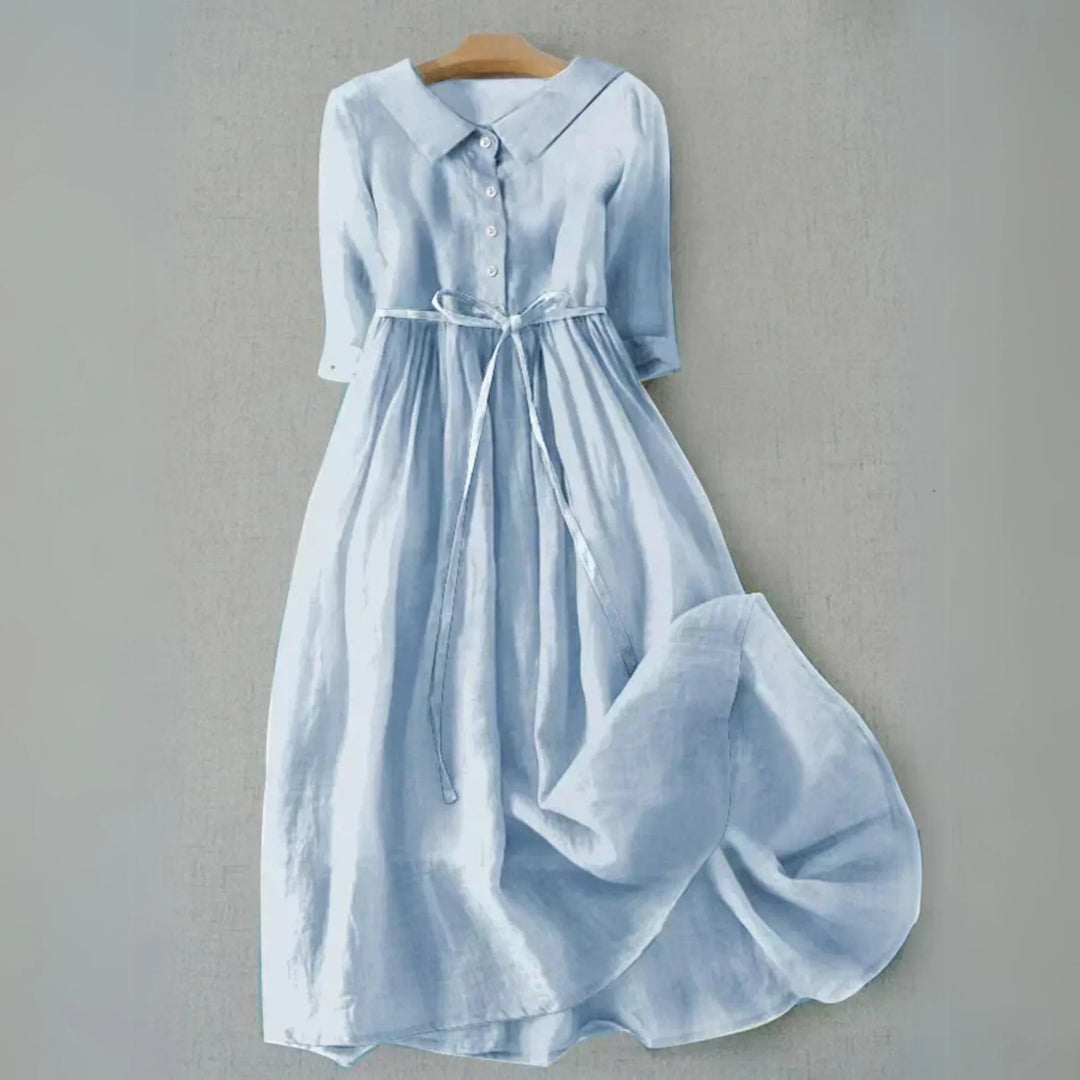 Sky blue Peter Pan collar midi dress, model at three-quarter turn