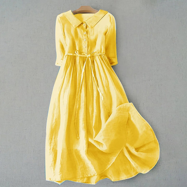 Yellow Peter Pan collar midi dress on standing model