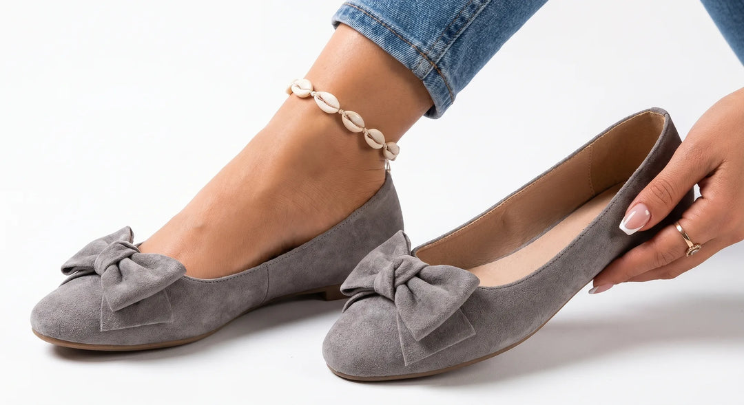 Gray ballet flat with bow detail, front view