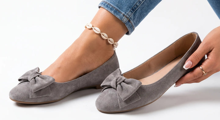 Gray ballet flat with bow detail, front view