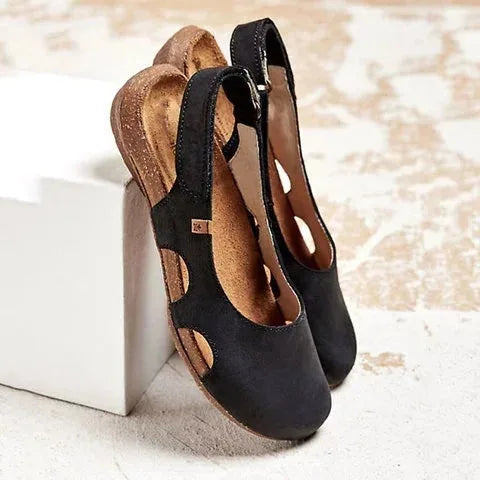 Black cutout slingback sandal, close-up detail view