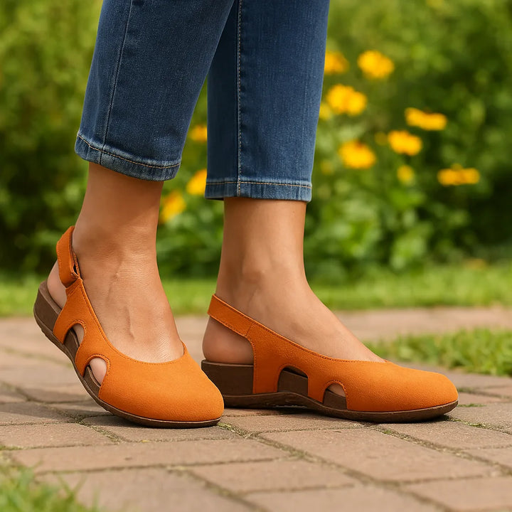 Orange cutout slingback sandal, three-quarter angle view