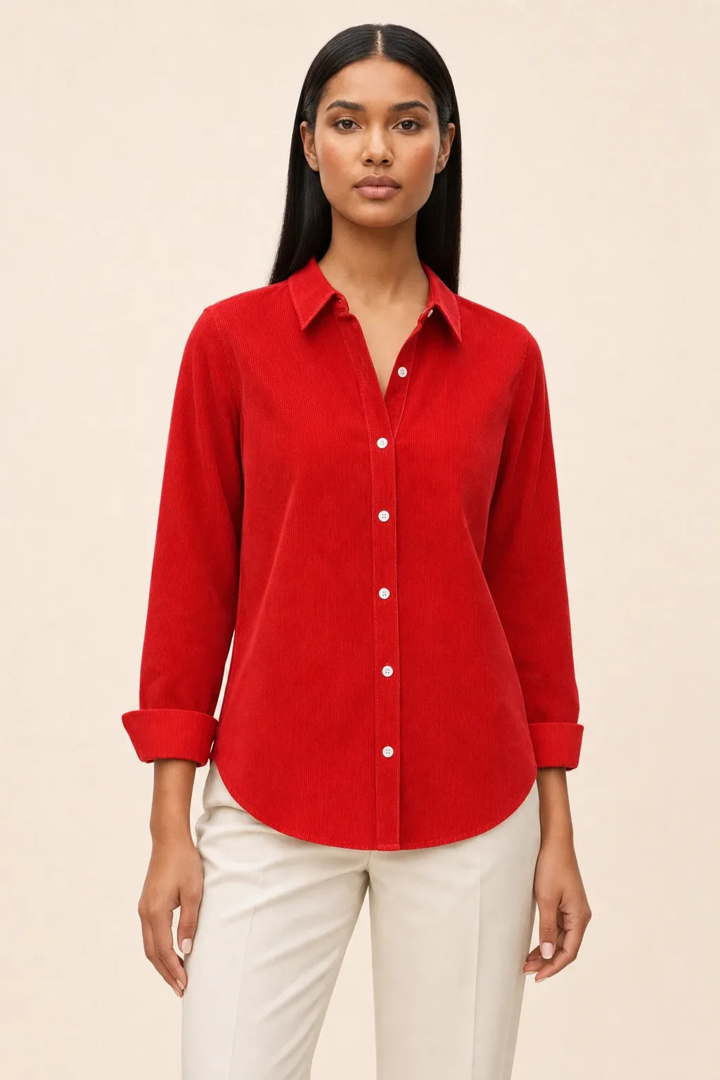 Red relaxed button-down blouse on a model in a contrapposto stance