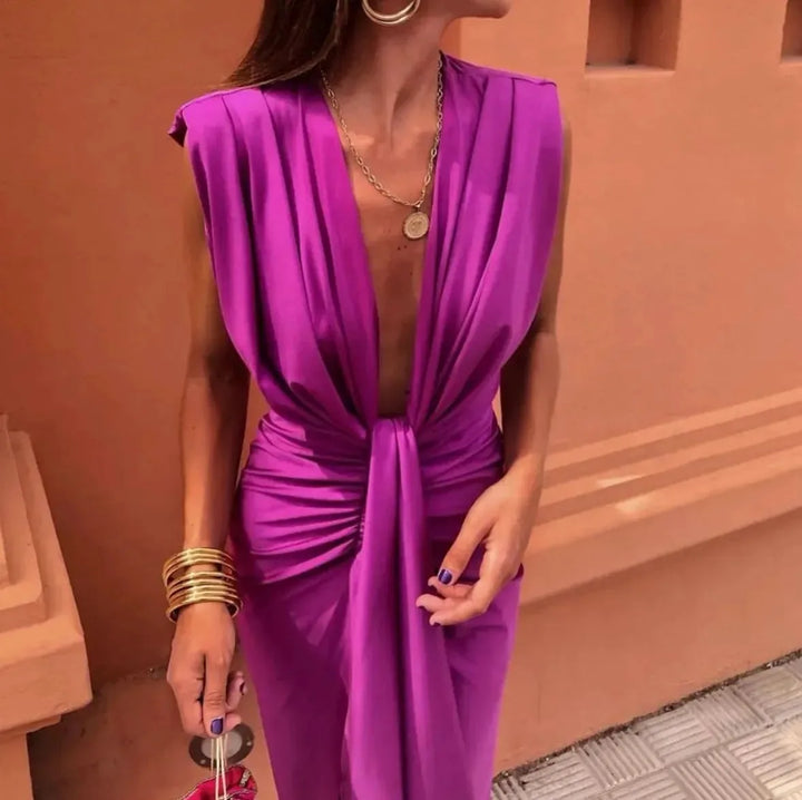 Woman in a blue twist-front maxi dress, alternate full-length view