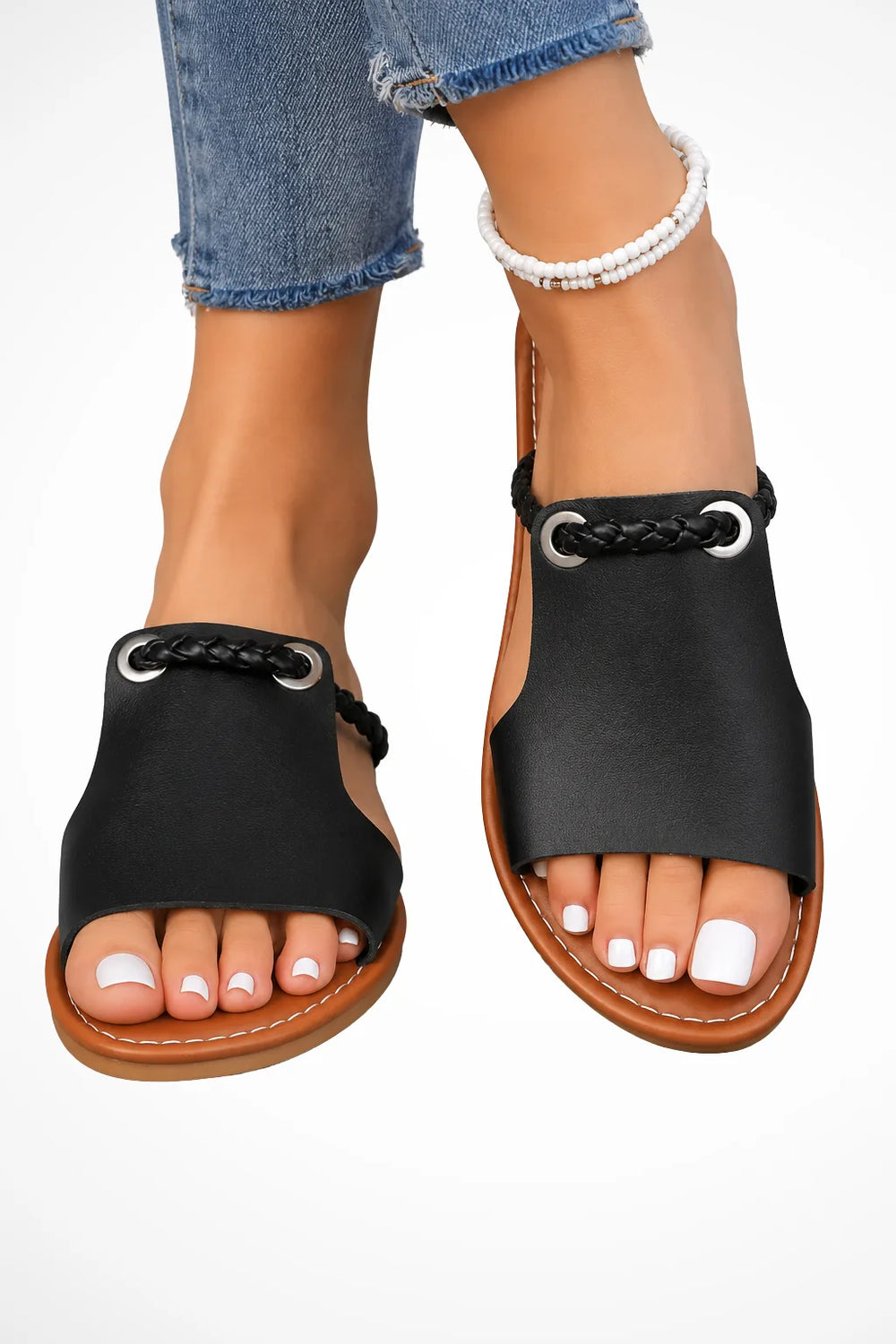 Black slide sandal with braided strap, front view