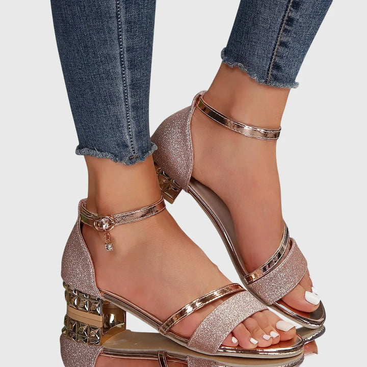 Black metallic block heel sandal, heel view