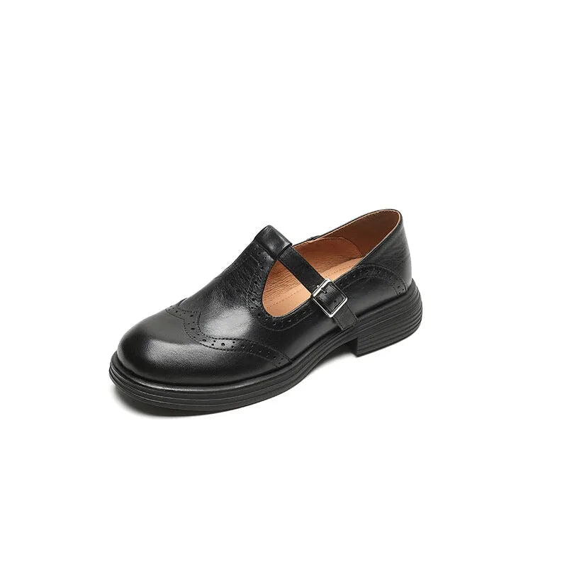 Black leather brogue Mary Jane shoe with perforated detailing, front view