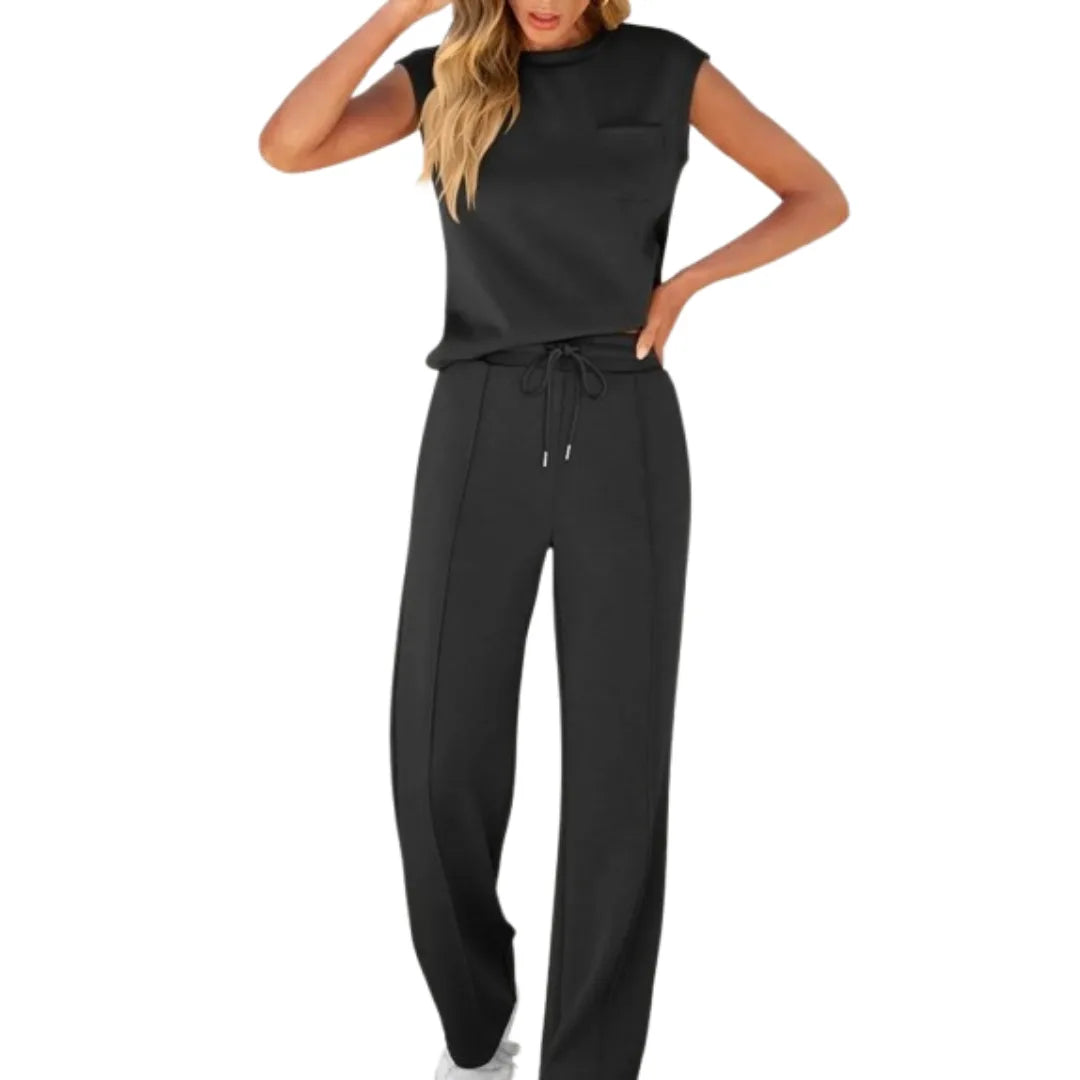 Black cap sleeve top and matching wide-leg trousers, model facing forward