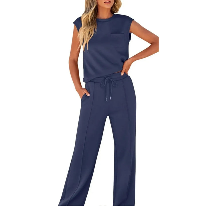 Dark blue cap sleeve matching trouser set on standing model