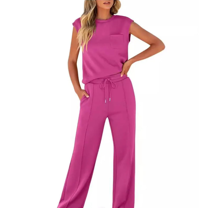 Rose red cap sleeve top and trousers, model shown from the side