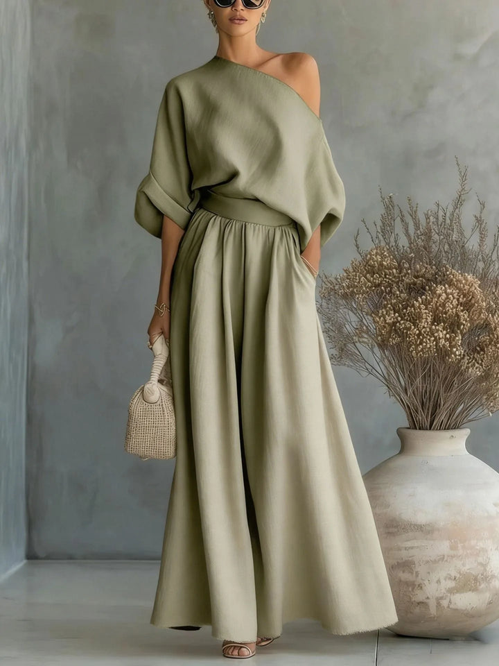 Green off-shoulder crop top and wide-leg trouser set on standing model