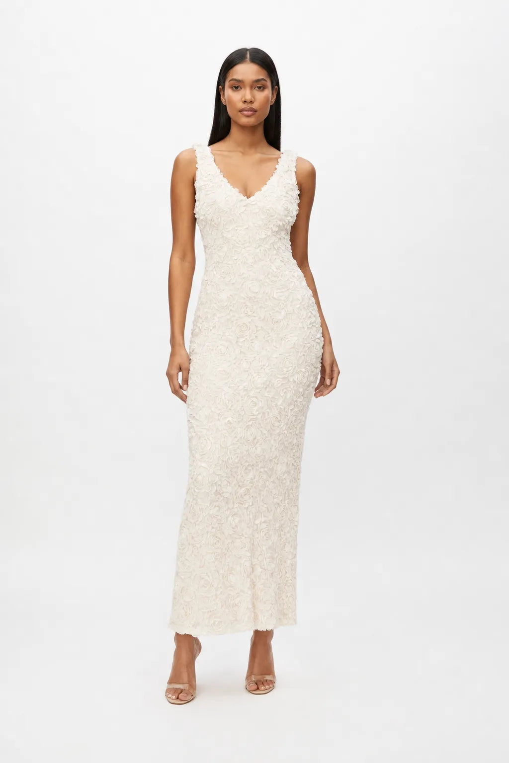Rosette bodycon maxi dress on model in contrapposto stance
