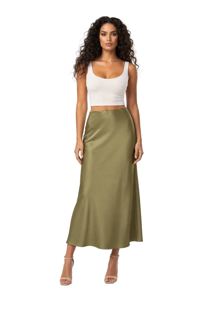 Dark green satin midi skirt on model in contrapposto stance