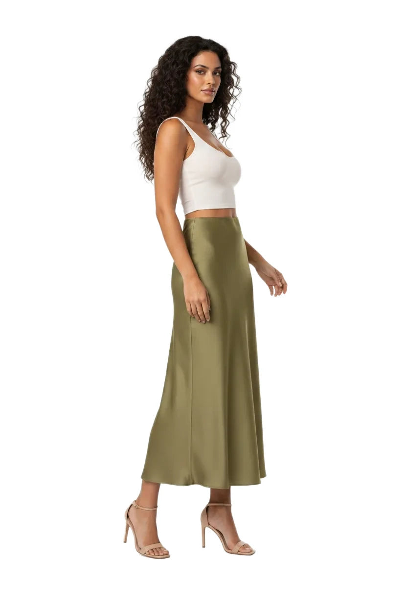 Dark green satin midi skirt on model in three-quarter turn