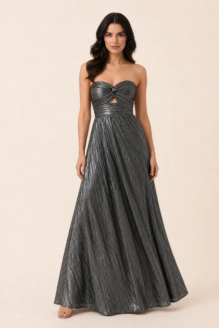 Black twist front floor-length gown on model in contrapposto stance